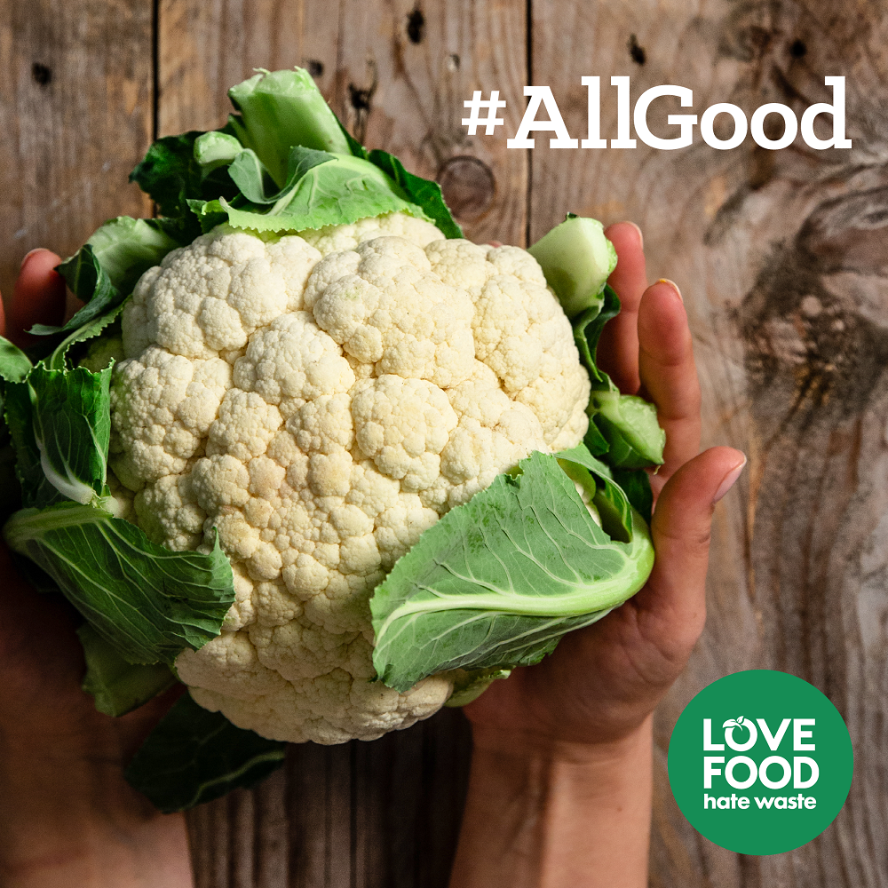 Image of hands holding cauliflower